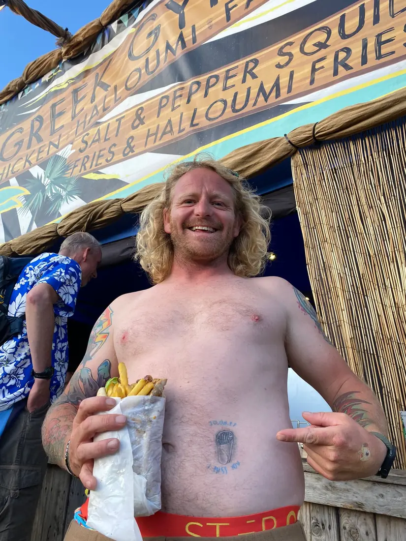 A chicken gyros wrap packed with golden fries