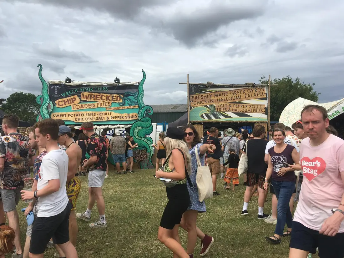 The Chip Wrecked and gyros units in a busy festival field
